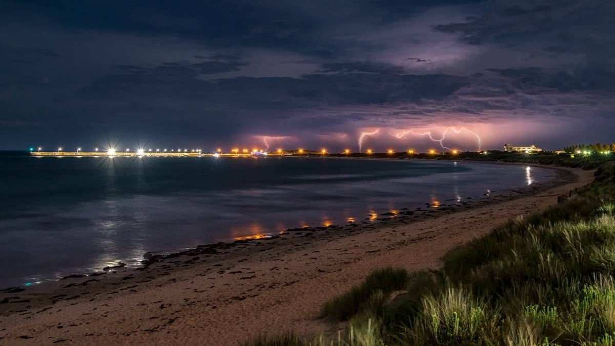 Lightning strikes over Lady Bay. Photo: Craig Richards