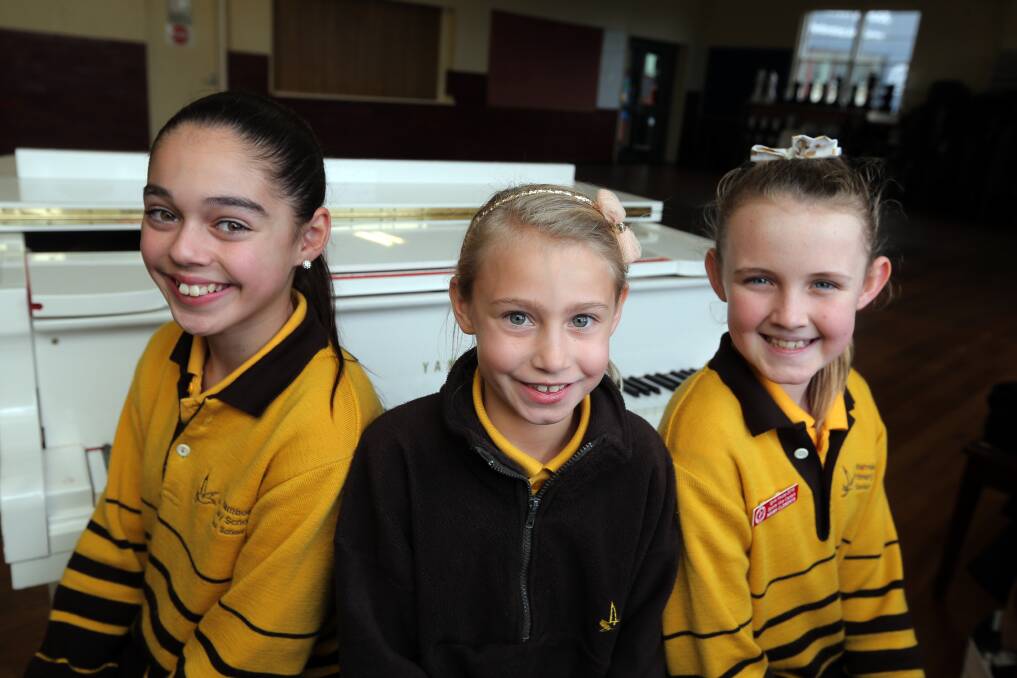 Warrnambool Primary students Phoebe Marris, 12, Jasmin James, 8, and Niamh Clements, 11, will be part of the chorus for the Opera Australia performance of The Marriage of Figaro, which will be performed at the Lighthouse Theatre. Picture: Rob Gunstone