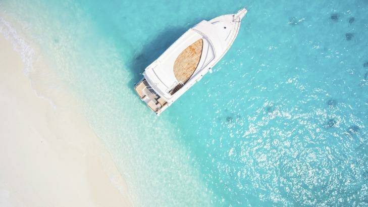 aerial view of luxury boat anchored in tropical lagoon close to sandy beach topview yacht in tropical lagoon
Credit iStock 
tra6maldives Photo: amriphoto