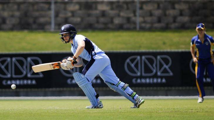Tough cookie: Alyssa Healy made 65 not out for NSW after being hit on the head. Photo: Rohan Thomson