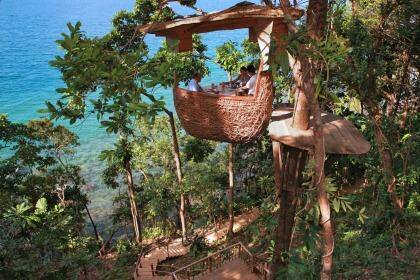 Dine in a Treepod at Soneva Kiri Resort on the island of Koh Kood, Thailand.

