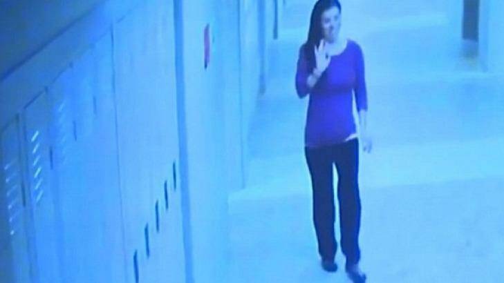 In this screengrab, maths teacher Colleen Ritzer waves in the hall of Danvers High School, moments before she was killed. Photo: WCVB/ABC 5