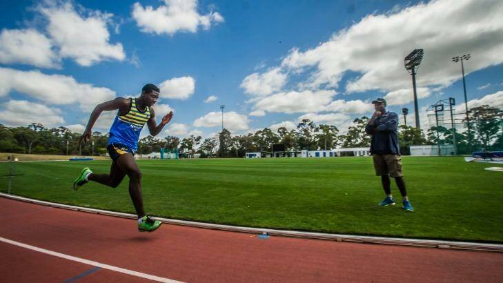 Canberra schoolboy Edward Osei-Nekita broke the under-16 national 100m record and his coached by his father Augustine Nketia who holds the NZ 100m record. Photo by Karleen Minney. Photo: karleen minney