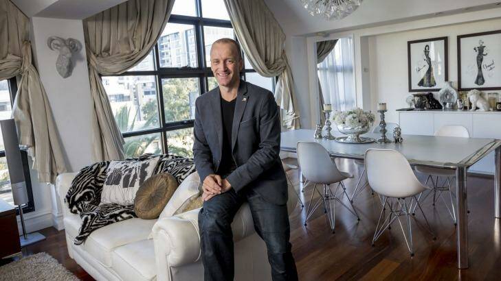 Craig Yelland, director of Plus Architecture, is a big advocate for apartment living. He is pictured in his Port Melbourne apartment, where has lived for five years with his wife and two children.  Photo: Eddie Jim