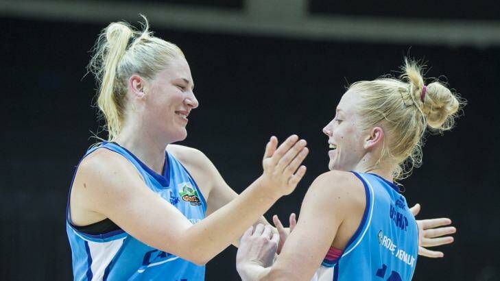 Lauren Jackson and Abby Bishop are beginning to form a deadly front court partnership for Canberra Capitals. 
 Photo: Matt Bedford