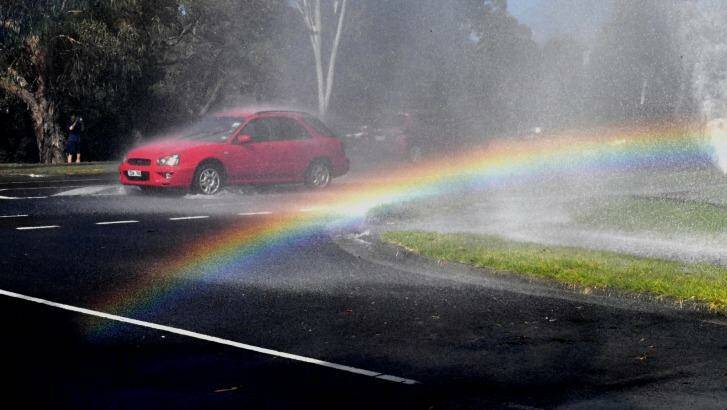 Motorists were treated to some spectacular rainbows. Photo: Joe Armao