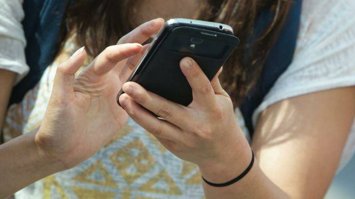 The new laws will ensure that young people who receive or send raunchy but non-exploitative sexts are spared from child pornography offences. Photo: Glenn Hunt