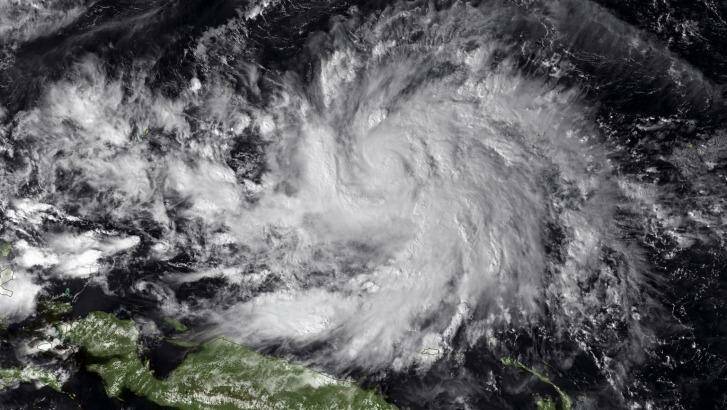 Typhoon Hagupit is seen to the north of New Guinea in this image from Tuesday. Photo: US National Oceanic and Atmospheric Administration