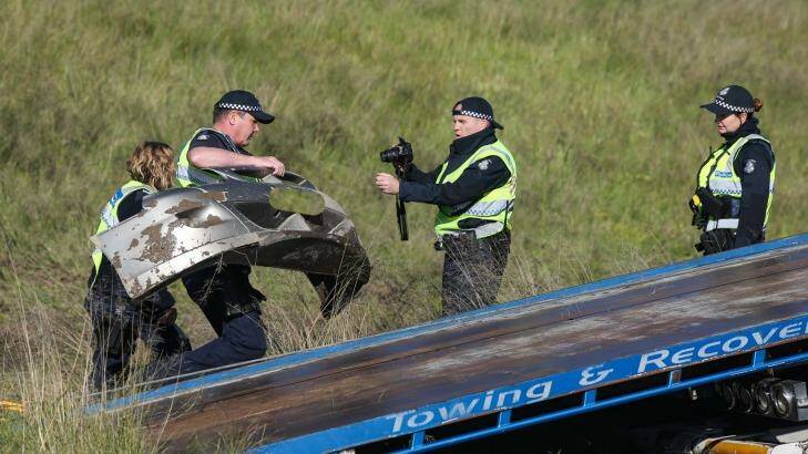 Police photograph the second car involved in the fatal crash in Barnawartha North.  Photo: Mark Jesser/Border Mail