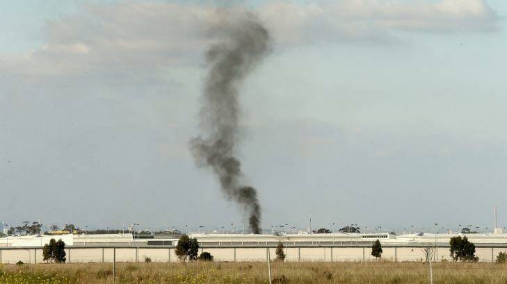 Smoke seen from the Metropolitan Remand Centre in Ravenhall on Tuesday. Photo: Pat Scala