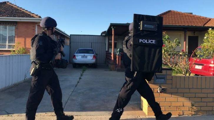 The sleeping suburb of St Albans is now crawling with special operations police. Photo: Twitter/@NearyTy_9