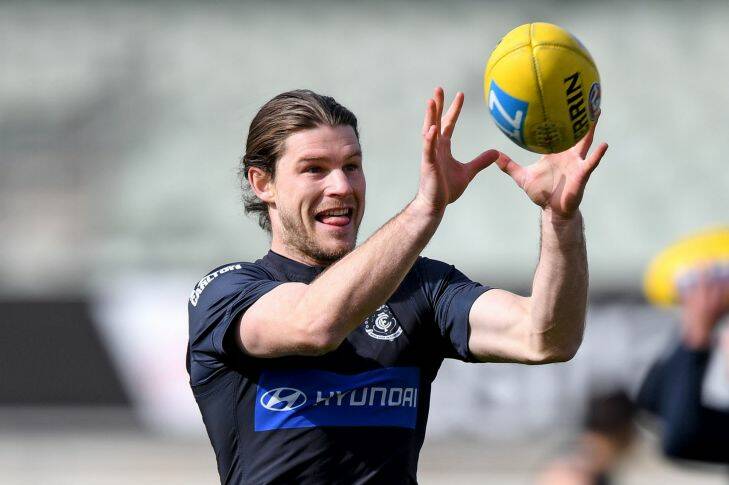 Blues player Bryce Gibbs catches the ball during the Carlton Blues training session at Princes Park in Melbourne, Friday, August 18, 2017. (AAP Image/Joe Castro) NO ARCHIVING