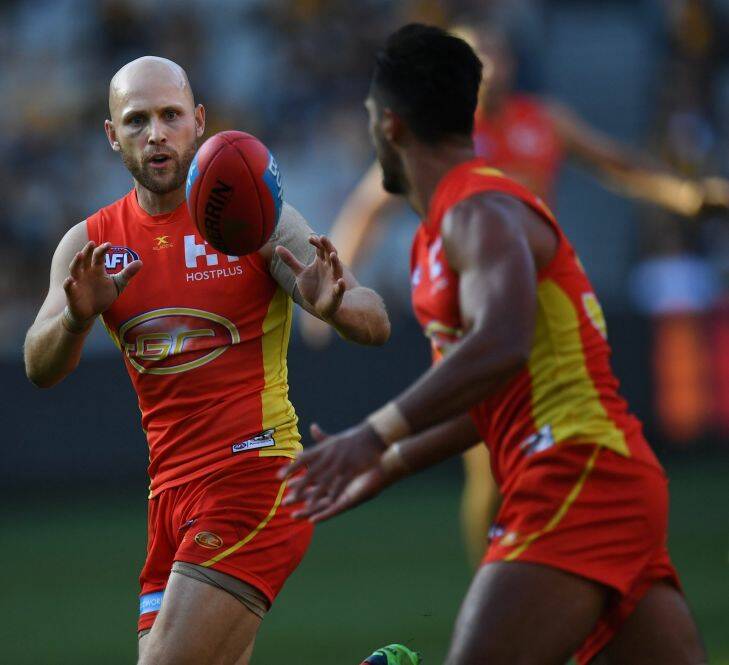 Gary Ablett of the Suns (left) is seen in action during the Round 12 AFL match between the Hawthorn Hawks and the Gold Coast Suns at the MCG in Melbourne, Saturday, June 10, 2017. (AAP Image/Julian Smith) NO ARCHIVING, EDITORIAL USE ONLY .