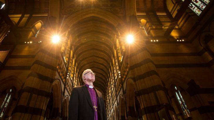 Anglican Archbishop Dr Philip Freier in St Paul's Cathedral after the church's 350 lights were replaced with energy-efficient bulbs to cut emissions and save power. Photo: Jason South