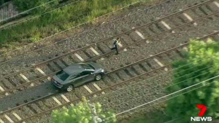 A car was stuck on the tracks, causing major delays to Hurstbridge line. Photo: Twitter/@7NewsMelbourne
