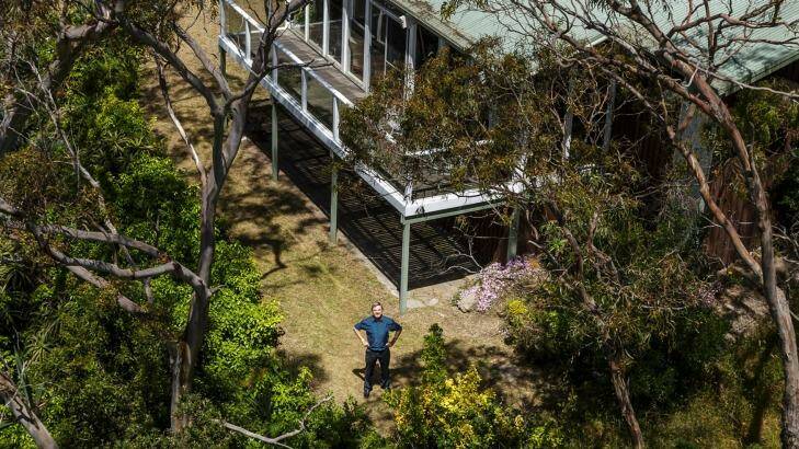 Professor Alan Hajek, son of Vladimir Hajek, the founder of the original Arthurs Seat chairlift in 1960. Alan stands in the backyard of the house he grew up in (as seen from a cable car).  Photo: Daniel Pockett
