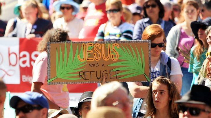 Protesters their point during the Palm Sunday March in Melbourne. Photo: Graham Denholm