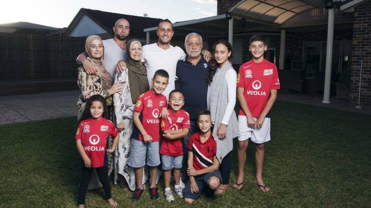 Tarek Elrich with his family at home in Merrylands. Photo: James Brickwood