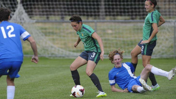 The Matildas have a friendly match with an ACTAS boys team at the AIS. Ashleigh Sykes (3) in action. Photo: Graham Tidy