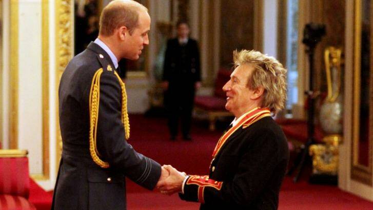 Buckingham Palace is used for dozen of royal engagements each week. Here's Prince William turning Rod Stewart from a singer into a knight. Photo: PA