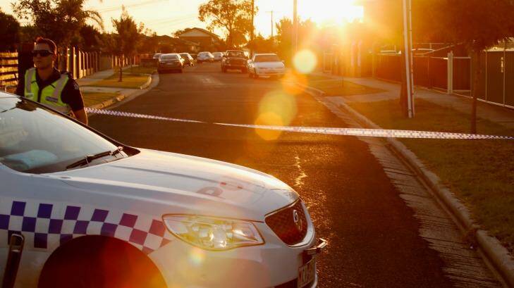 The suburban street in Albanvale, cordoned off after the grisly discovery of the bodies of a grandmother and her grandson. Photo: Darrian Traynor