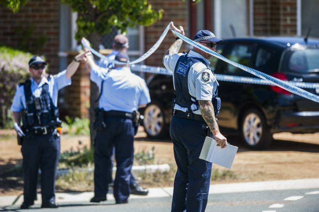 Family tragedy: Police on the scene of last night's death on Dexion Place in Dunlop. Photo: Rohan Thomson