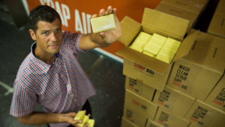 Michael Matulick from Melbourne-based not-for-profit group Soap Aid, with soap made from recycled hotel soap. Photo: Simon Schluter
