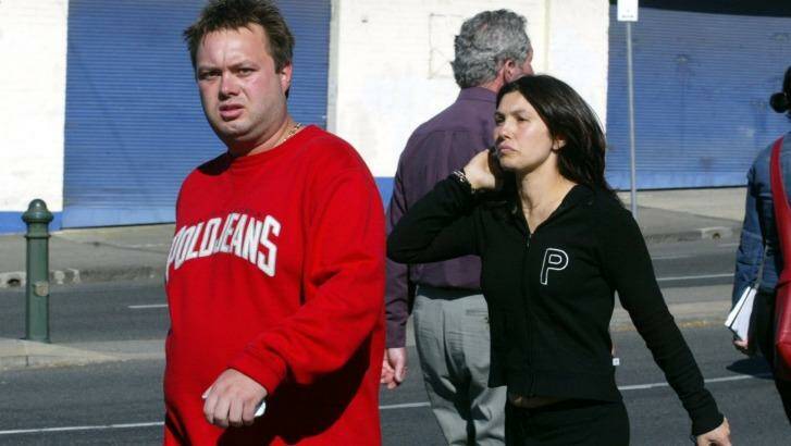 Carl Williams with his wife Roberta at the scene of a gangland murder in 2004. Photo: Angela Wylie