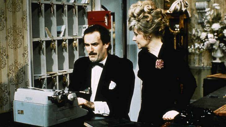 Fawlty reception: Basil and Sybil  at the front desk.  Photo: BBC