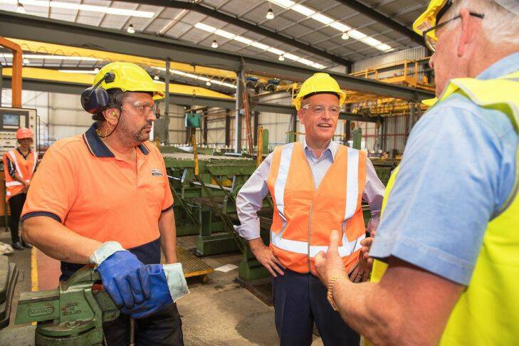 Federal Opposition Leader, Bill Shorten visits manufacturer Milltech Martin Bright in Laverton North, Melbourne, Thursday, January, 18, 2018.  (AAP Image/Ellen Smith) NO ARCHIVING