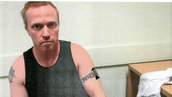 History of violence: Adrian Bayley in police custody after killing Jill Meagher. Photo: Supplied 