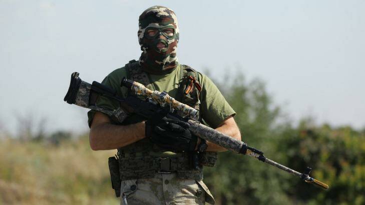 A pro-Russian rebel sniper on the outskirts of Shakhtersk in eastern Ukraine, July 2014. Photo: Kate Geraghty