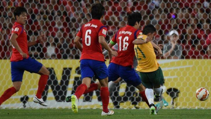 Massimo Luongo fires home the opening goal for the Socceroos.  Photo: Brendan Esposito