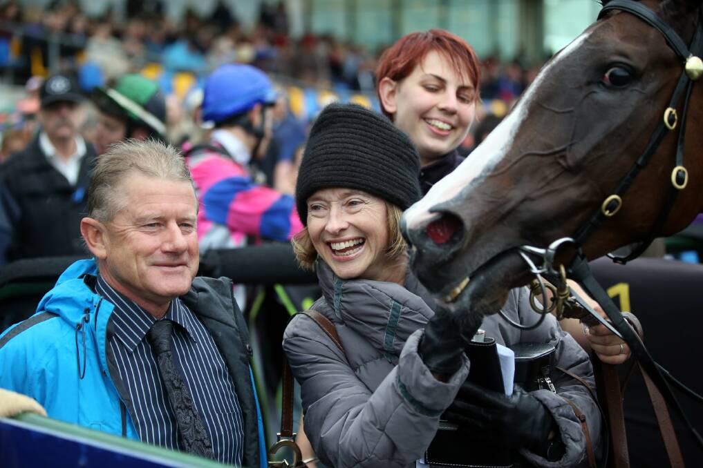 Gai Waterhouse and her Melbourne stable foreman Roger Elliott are all smiles after the maiden hurdle win of Tenby Lady at last year's May Racing Carnival. Picture: DAMIAN WHITE 