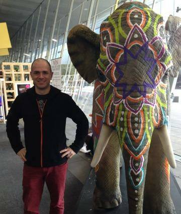 Stylish: Alex Hutchison poses with a life-size model from his latest creative effort, Far Cry 4, at PAX Australia in Melbourne. Photo: Supplied