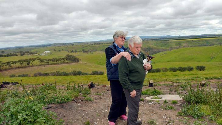 Fran and Reg Cleland at the site of their house, which was razed in the Mickleham-Kilmore fire. Photo: Joe Armao