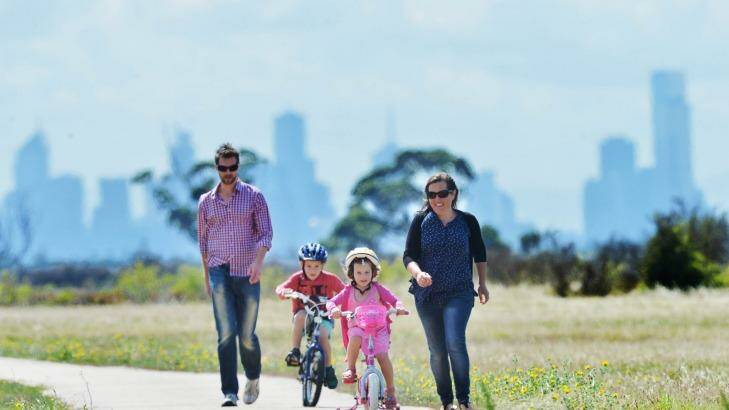 Alice and Jason Osborne in Point Cook, where they live with their children William, 7, and Lucy, 4. Photo: Joe Armao