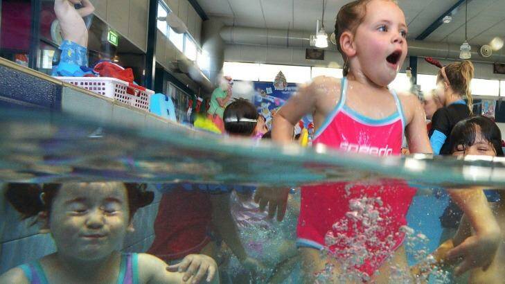Learning time: Leila Tipping learns to swim at St Bernard's College pool. Photo: JOE ARMAO