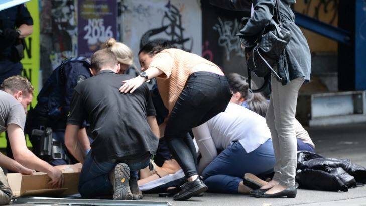 Three were killed and fifteen were injured after a car ran down pedestrians in Bourke Street. Photo: Justin McManus