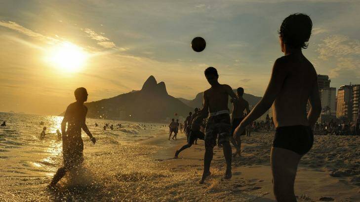 Soccer at sunset, Ipanema Beach, Rio de Janeiro, Brazil. Photo: iStock