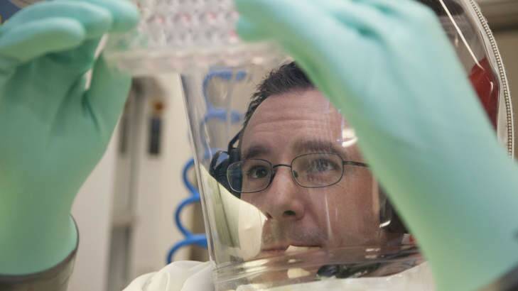 Research scientist Glenn Marsh working at CSIRO's Australian Animal Health Laboratory in Geelong.