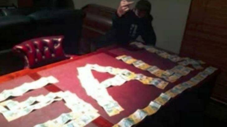 Cash spread on a table, posted to Keiarhn Carter's Facebook page on May 22, 2015. Photo: Facebook/@Keiarhn Carter
