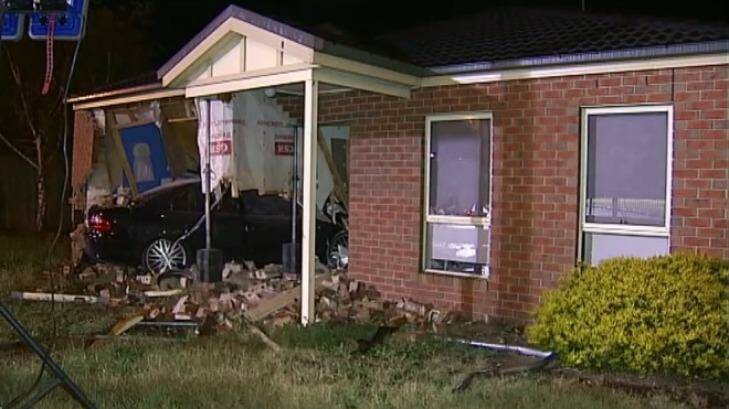 The car crashed into the Breakwater home about 8.30pm on Sunday. Photo: Nine News