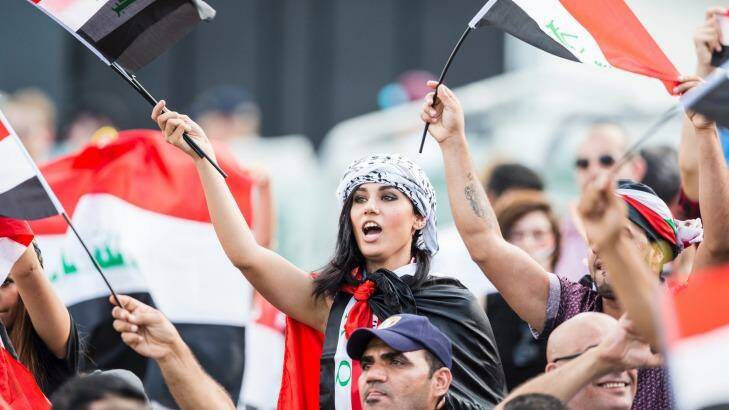 Good show: Iraq fans show their support during the Asian Cup. Photo: Matt Bedford