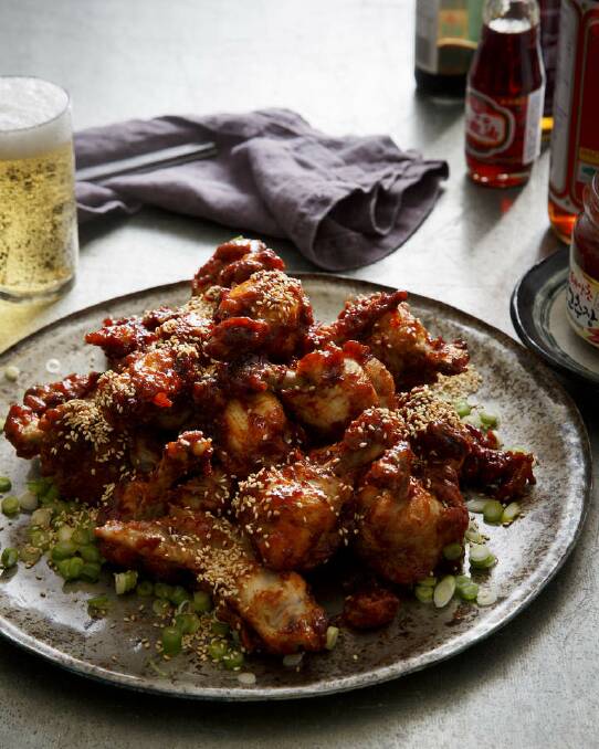 Karen Martini's Korean fried chicken coated in sticky, sweet and salty chilli sauce <a href="http://www.goodfood.com.au/good-food/cook/recipe/koreanstyle-fried-chicken-20140716-3c04w.html"><b>(recipe here).</b></a> Photo: Marcel Aucar