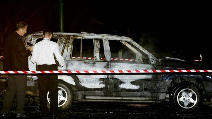 Homicide detectives at the scene in 2008 where a burnt-out jeep was found in Burwood East. Photo: Darren Apps