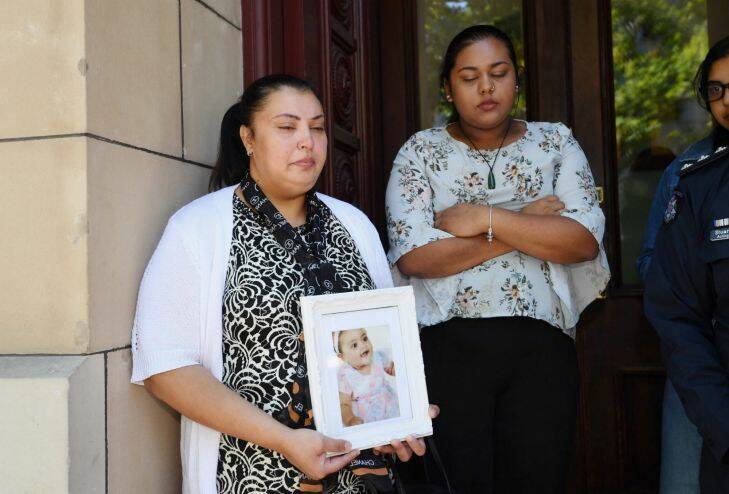 The Age, News, 23/11/2017 photo by Justin McManus. Sofina Nikat was sentenced for infanticide for drowning her baby. She was able to leave court a free woman today after already serving time and a 12 month community corrections order. Family members not happy with the decision Zureen Sahib and Zahraa Sahib with a picture of baby Sanaya.