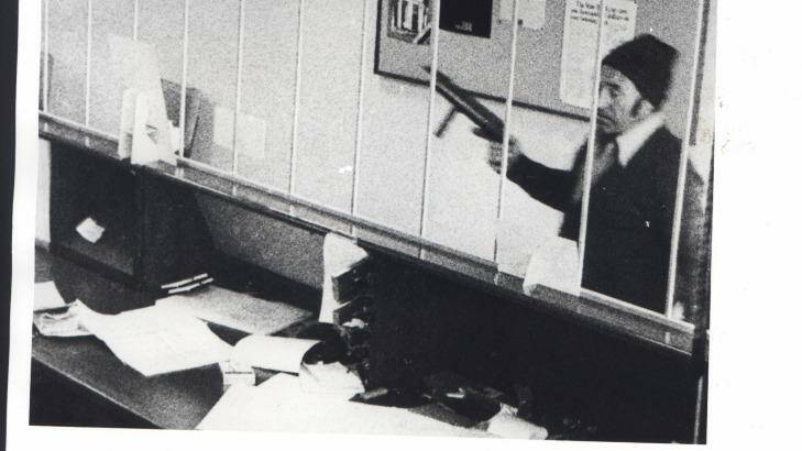 Snapped: Australia's oldest armed robber Aubrey Broughill  holds up a bank in 1978. His corpse's lack of testicles was attributed to the snacking habits of eastern snake-necked turtles. Photo: Supplied
