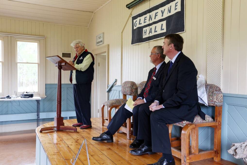 Camperdown Timboon Rail Trail chairman Pat Robertson speaks at the opening of new recreation facilities adjacent to Glenfyne Hall as Corangamite Shire councillor Peter Harkin and MP Terry Mulder look on.  Picture: LEANNE PICKETT 