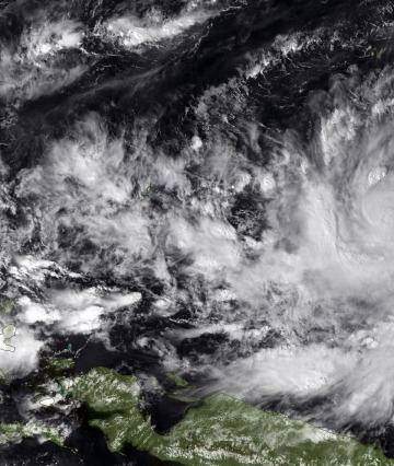 Typhoon Hagupit is seen to the north of New Guinea in this image from Tuesday. Photo: US National Oceanic and Atmospheric Administration